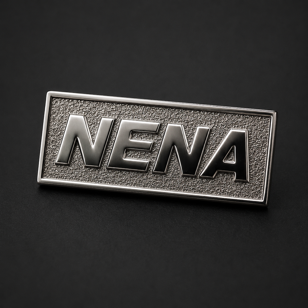 Pin's métallique avec le logo NENA